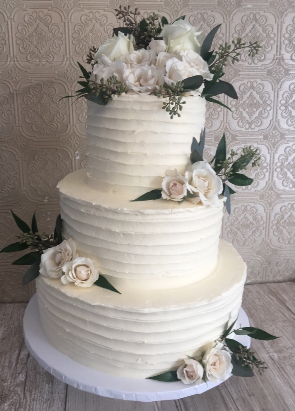 wedding flowers ivory roses & ribbons with greenery cake 3 tier topper 